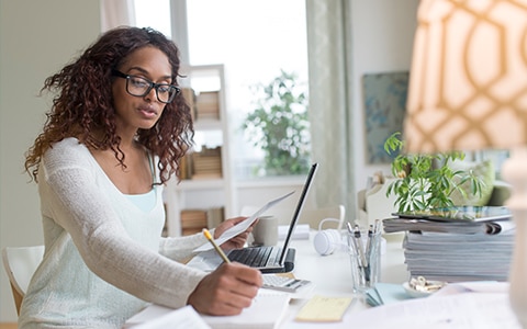 Women setting up her home office