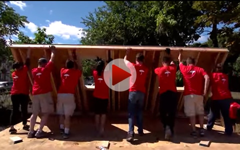 Travelers employees building home