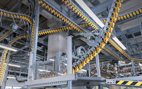 A machinery factory with gears and conveyor belts.