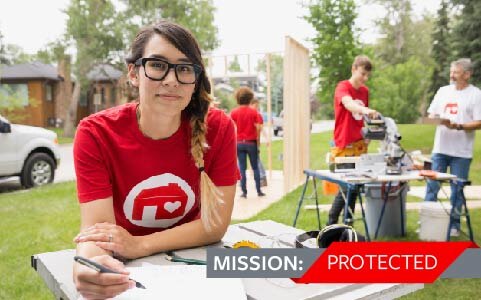 Volunteer on home build site