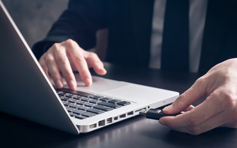 person practicing shadow it by using personal USB