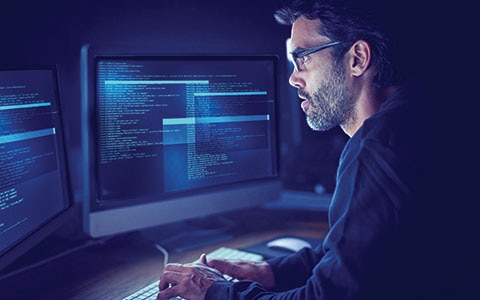 hacker using dark web for cyber breach