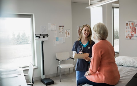 Nurse helping employee get back to work