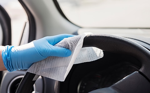 cleaning a driver steering wheel