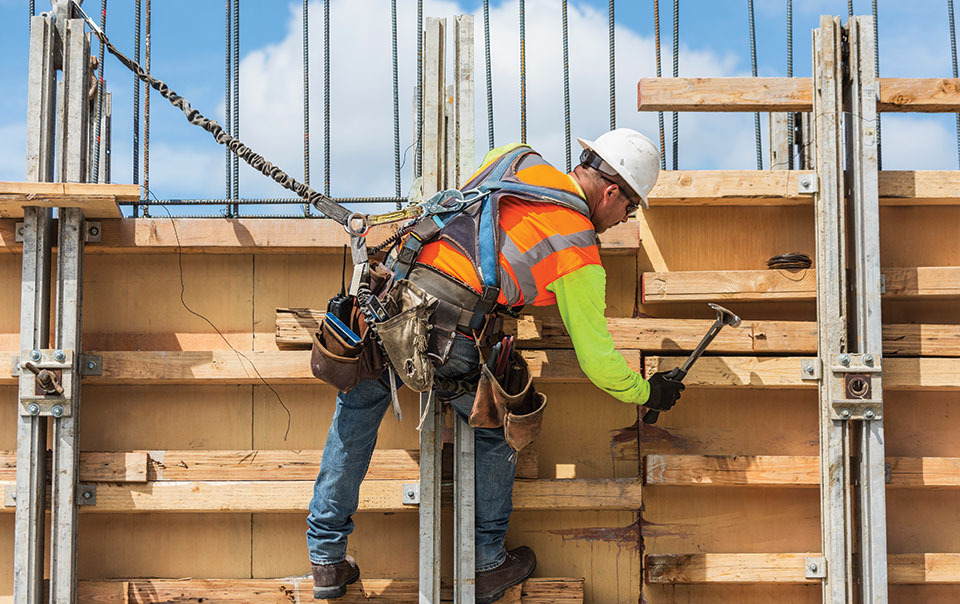 construction worker working on a scaffolding