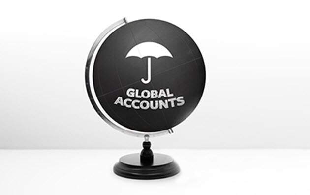 Globe with the words Global Accounts and the Travelers umbrella on it.