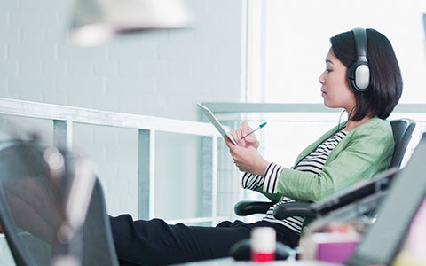 Young professional sitting in modern office