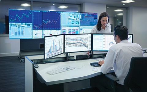 public workers checking monitors as part of smart city