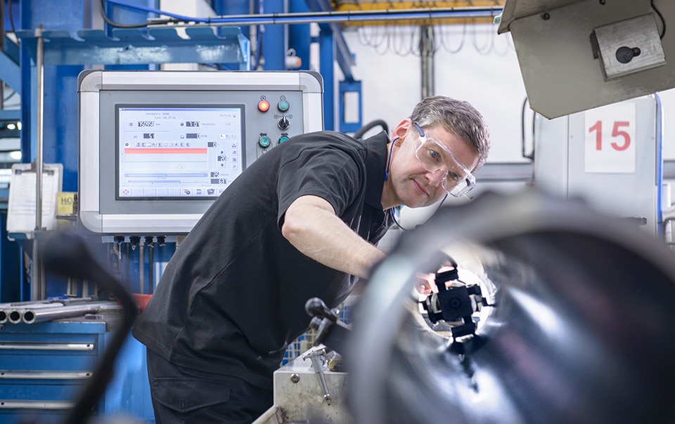 Manufacturer checking product as going through the supply chain