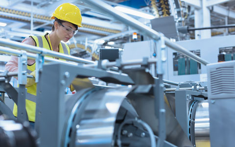 Manufacturer using equipment in factory