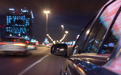 car on the road at night