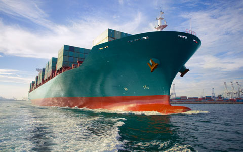 Cargo ship on the water in transit