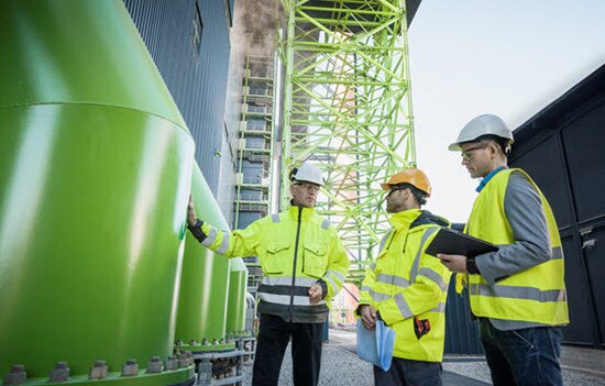 Engineers standing at renewable energy site
