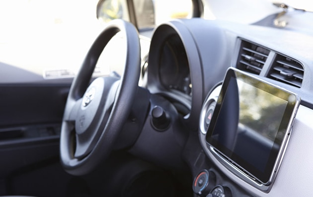 Tablet in front of car