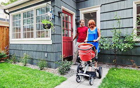 Family locking up home as part of home security checklist