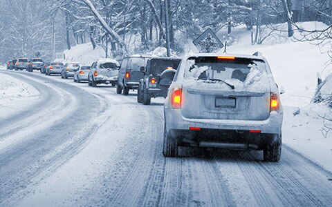 Car driving in snow