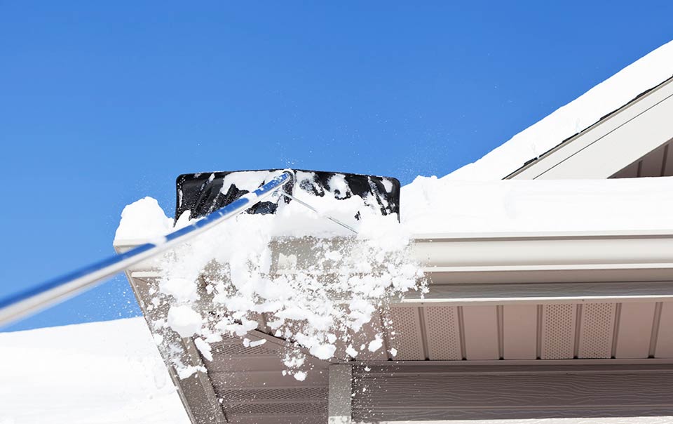 Removing snow from the roof