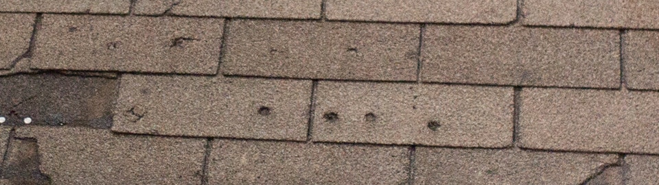 hail imprints on a roof