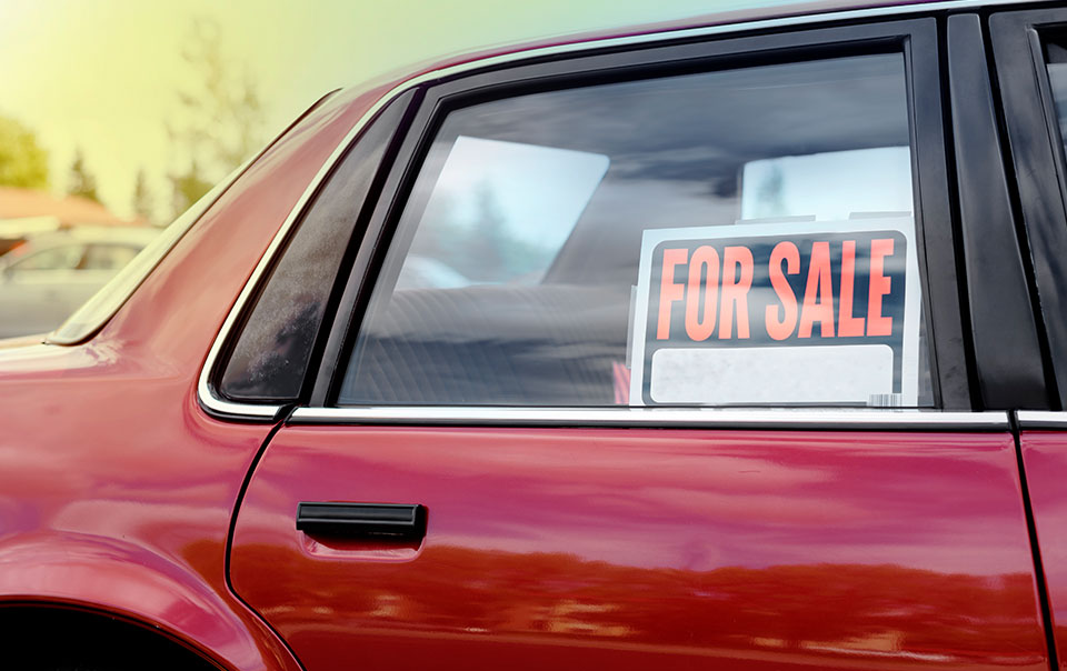 for sale sign on used car
