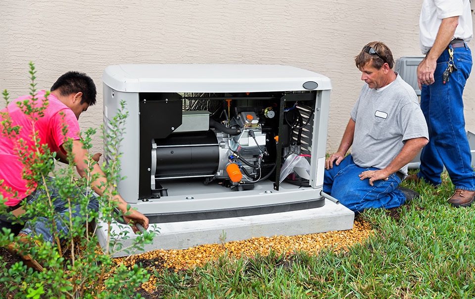 contractor installing home generator