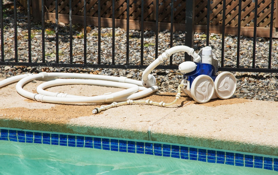 Pool equipment on side of pool