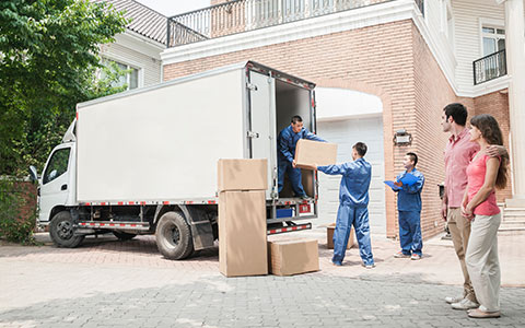 family using moving company to move